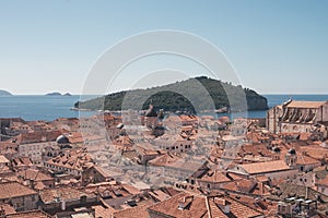 Empty red roof tiles and green islands near Dubrovnik Old town during corona virus