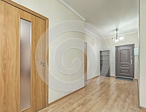 Empty residential house entrance with closed doors