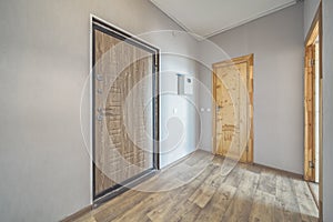 Empty residential house entrance with closed doors