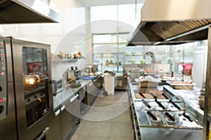 Empty restaurant kitchen is blurred for background