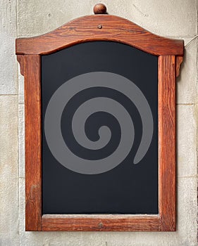 Empty restaurant menu board hanging on the wall