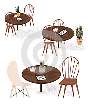 Empty restaurant tables during a pandemic and quarantine. Furniture for a cafe. Tables and chairs with flowers, napkins and menus.