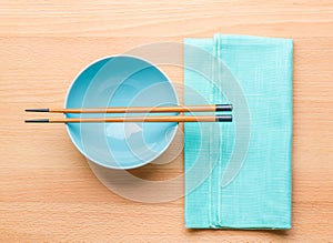 Empty rice bowl with bamboo chopsticks
