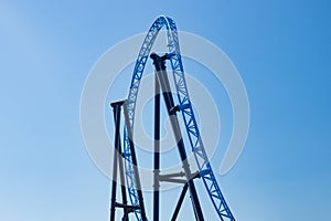 Empty ride roller coaster on sky background in amusement park