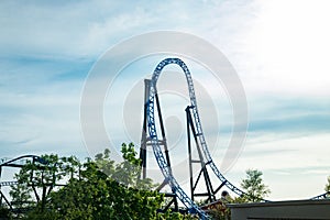 Empty ride roller coaster on sky background in amusement park