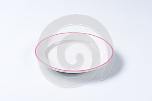 Empty rimmed dinner plate