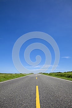 Empty road and blue sky