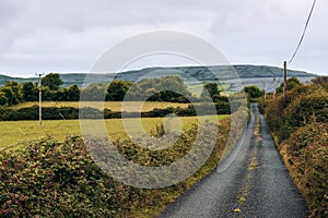 Empty road through The Burren in Ireland