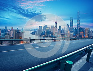 Empty road floor with bird-eye view at Shanghai bund Skyline