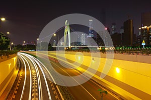 Empty road floor at car light trail of night scene