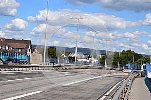 almost empty road with an intersection on RaiffeisenbrÃ¼cke