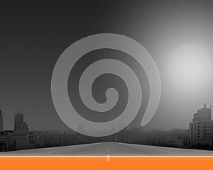 an empty road in the middle of a city at night