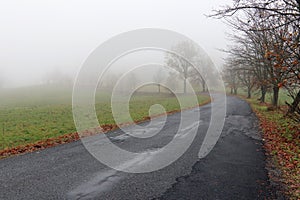 Empty road in misty day