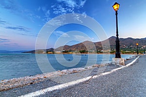 Empty road near Mirabello Bay at dusk