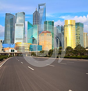 Empty road with Shanghai Lujiazui city buildings