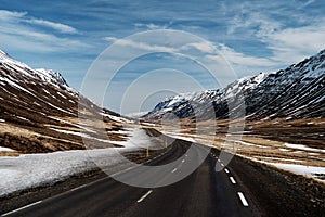 Empty road in snow landscape