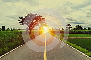 Empty road with sunset