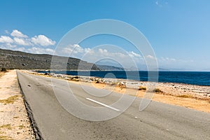 Empty road to guantanamo with the ocean Cuba