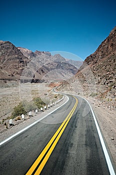 Empty road yellow line in Andes Mountains
