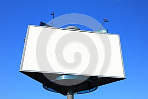 Empty roadside billboards at blue sky