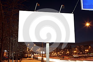 Empty roadside billboards at evening