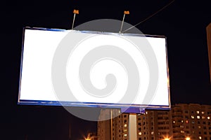 Empty roadside billboards at evening in city