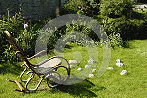 Empty rocking chair on the grass.