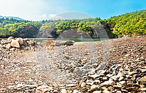 Empty rocky pavement and clean and comfortable autumn natural landscape.