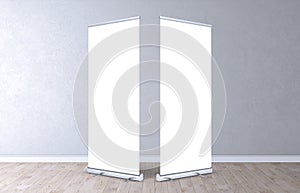Empty rollup banners stand. Exhibition stand roll-up banners, screen for you design. photo