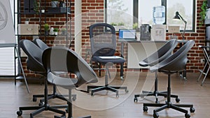 Empty room for aa support meeting with chairs in circle at group therapy session