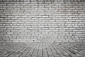 Empty room with bricks wall and tiled floor