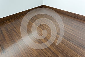 Empty room interior, brown wood laminate floor