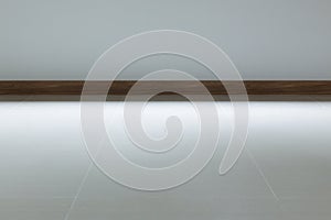 Empty room interior, white tile floor and white mortar wall