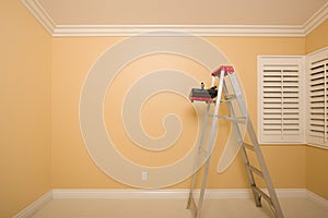 Empty Room with Ladder, Paint Tray and Rollers