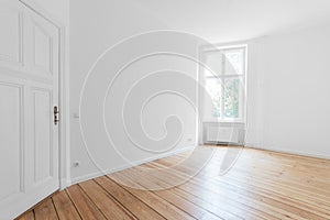 Empty room with parquet floor photo