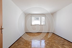 Empty room with vintage parquet