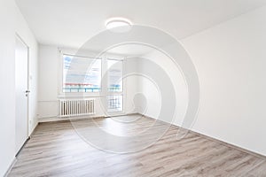 empty room with white walls in a new building, apartment for rent