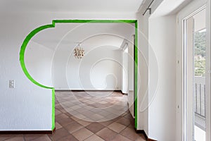 Empty room with white walls and terracotta floor