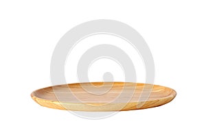 Empty round wooden tray isolated on white background