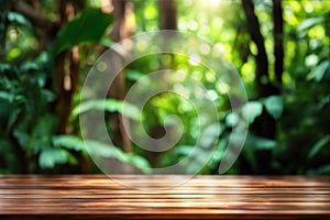 Empty rustic wood texture of old wooden tabletop, blur on green forest background Displaying layout, mounting your product,