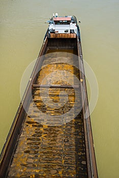 Empty and rusty container barge