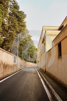 Empty s-curved path along the public skyline. Background of urban environment.