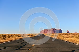 Empty scenic highway Highway 163 leading to Monument Valley.