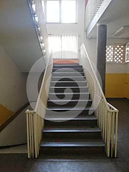 Empty school corridor with stairs