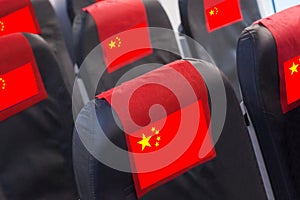 Empty seat in plane with Chinese Flag. Travel, flight and transportration in China concept