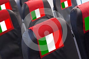 Empty seat in plane with Italian Flag. Travel, flight and transportration in Italy concept