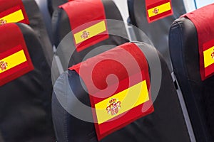 Empty seat in plane with Spanish Flag. Travel, flight and transportration in Spain concept