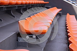 Empty seat rows in a track and field stadium