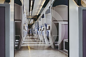 Empty seats and aisle in a train