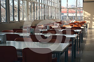 Empty seats of a highschool cafeteria after the cancellation of schools